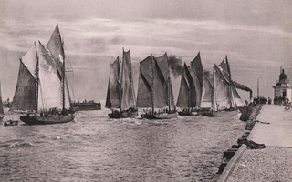 Silver-tinted print of boats on water.