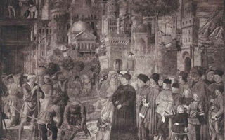 A crowd of people is watching construction. Buildings are in the background.