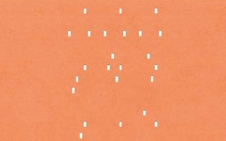 Orange paper with punched holes.