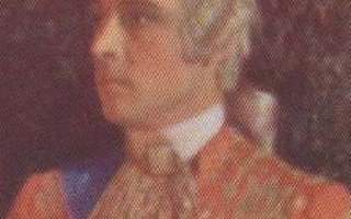 A man dressed in a red shirt, white collar, and a wig.