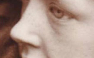 Enlarged view of a girl's face from the side.