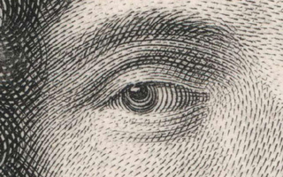 Enlarged version of copper engraving that focuses on a man's eye.