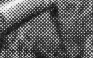 Enlarged view of the halftone dot pattern that shows series of inked dots.